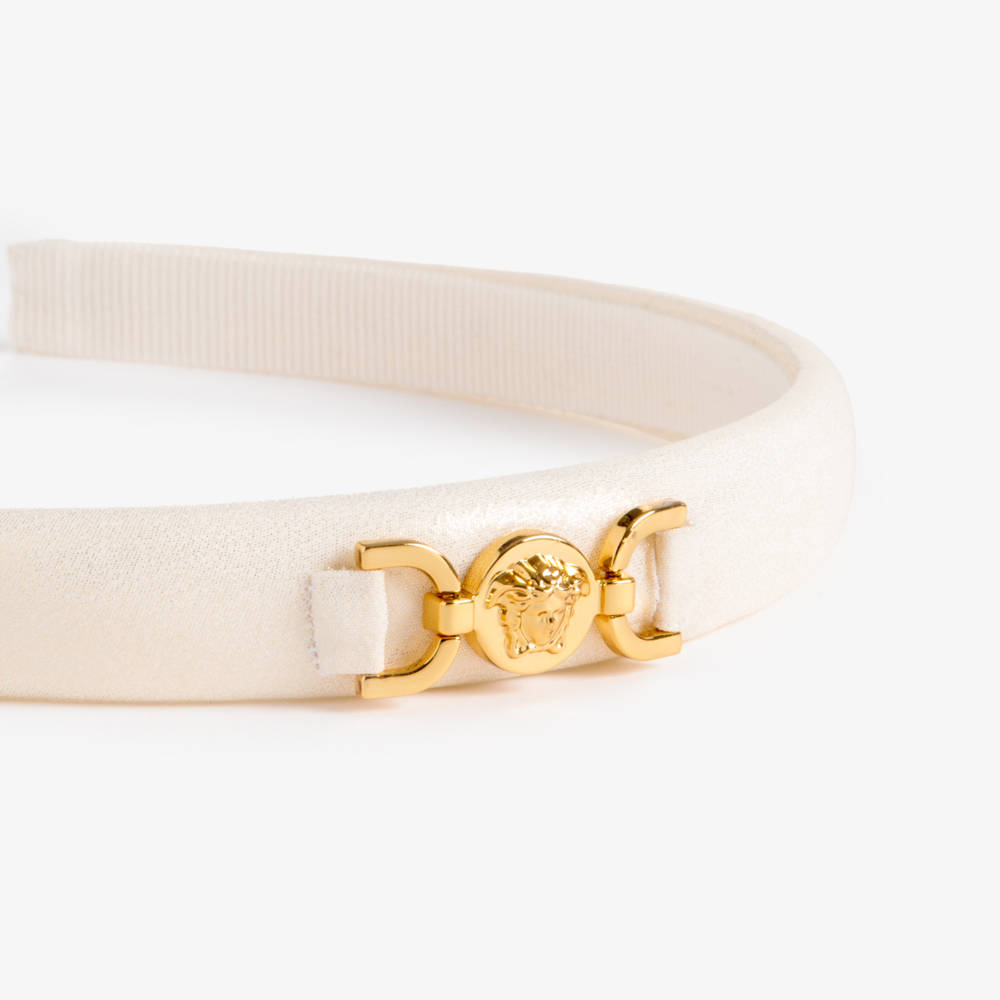 Versace-Girls Shimmery Ivory & Gold Medusa Hairband | Childrensalon