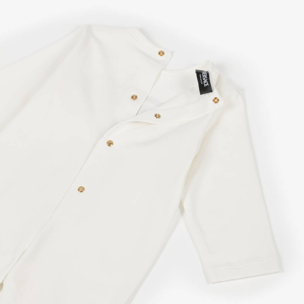 Versace-Ivory Cotton Jersey Safety Pin Logo Babygrow | Childrensalon