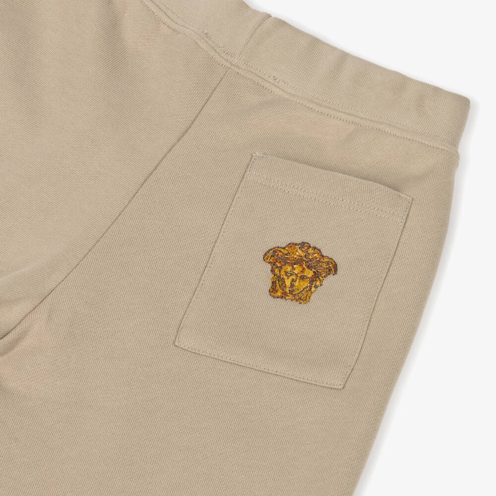 Versace-Junior Boys Beige Cotton Joggers with Embroidered Medusa Logo | Childrensalon