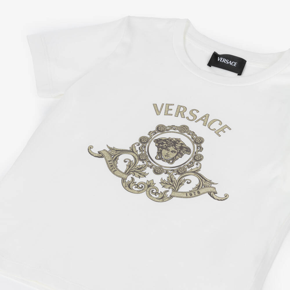 Versace-Junior Girls White Cotton Jersey T-Shirt with Gold Glitter Logo | Childrensalon