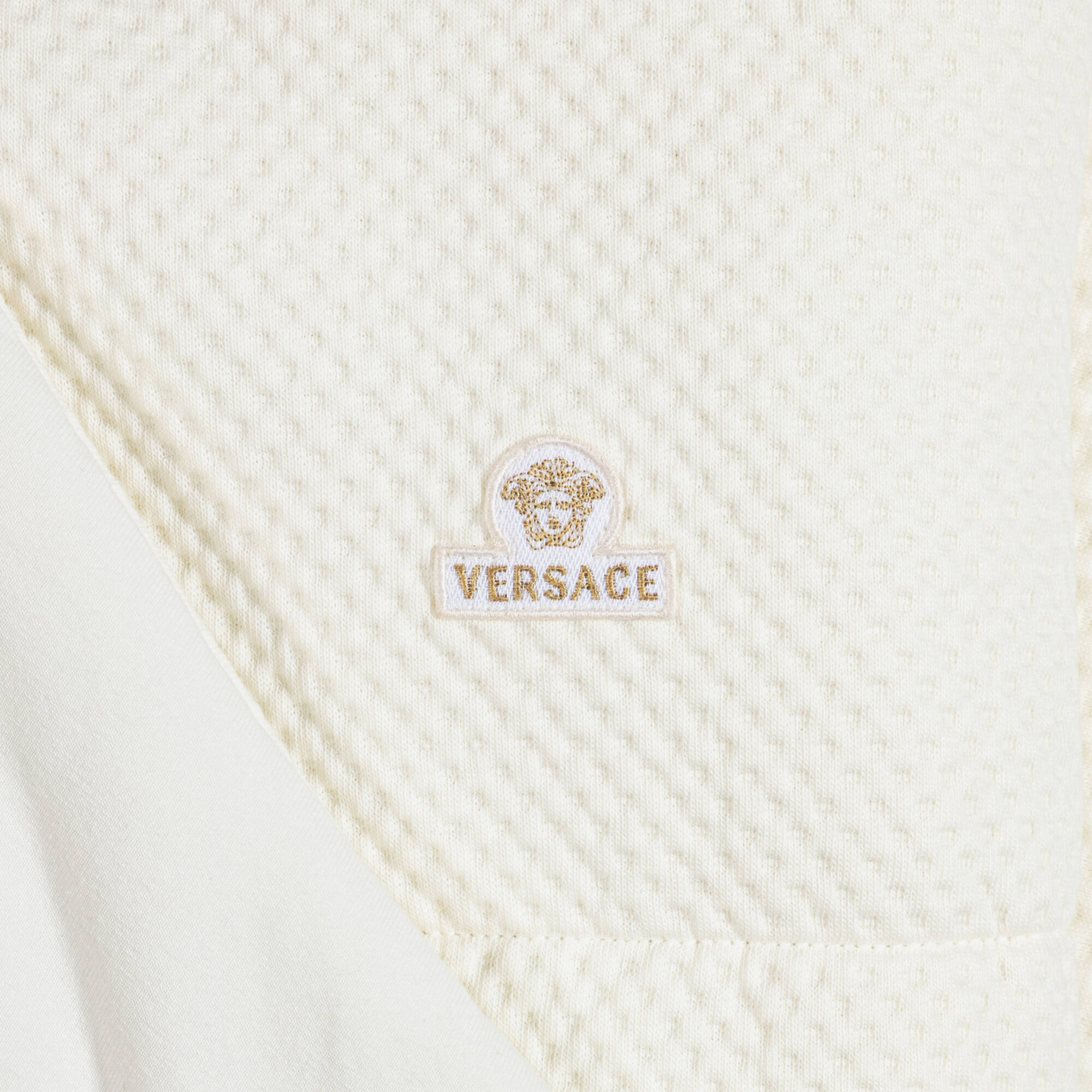 Versace - Ivory Waffle Texture Cotton Jersey Padded Nest (75cm ...