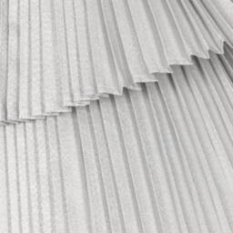 Hucklebones London-Baby Girls Glittery Silver Pleated Dress | Childrensalon