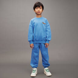 Mini Rodini-Blue Organic Cotton Joggers with Dog Motif | Childrensalon