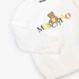 Moschino-Свитшот кремовый хлопковый с мишкой Тедди и ярким логотипом | Childrensalon
