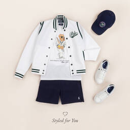 Ralph Lauren-حذاء رياضي بأربطة جلد صناعي لون أبيض وكحلي | Childrensalon