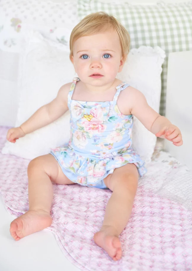 Baby boy wearing matching swimwear set for babies.