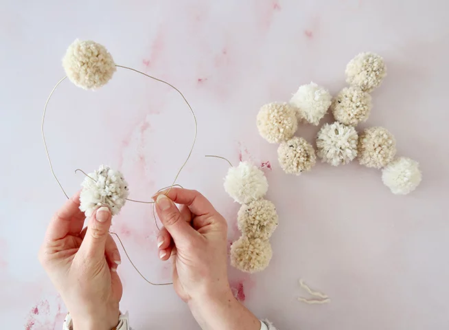 pom pom wreath, pom pom wreaths, pom pom wreath ideas, pom pom wreath diy, pom pom wreath tutorial, making a pom pom wreath, pom pom wreath instructions, how to attach pom poms to a wreath