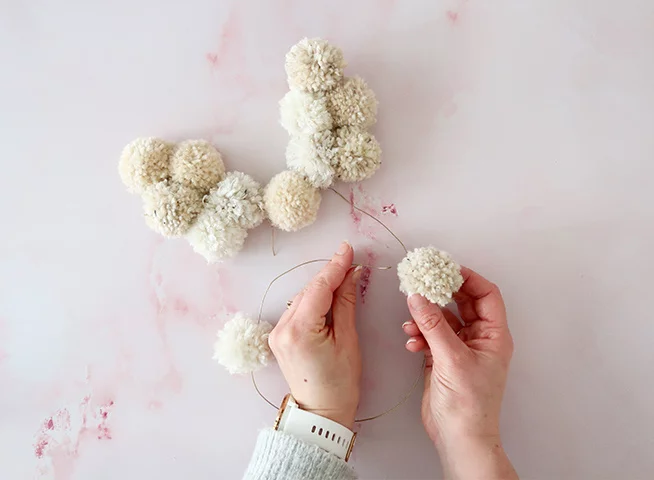 pom pom wreath, pom pom wreaths, pom pom wreath ideas, pom pom wreath diy, pom pom wreath tutorial, making a pom pom wreath, pom pom wreath instructions, how to attach pom poms to a wreath